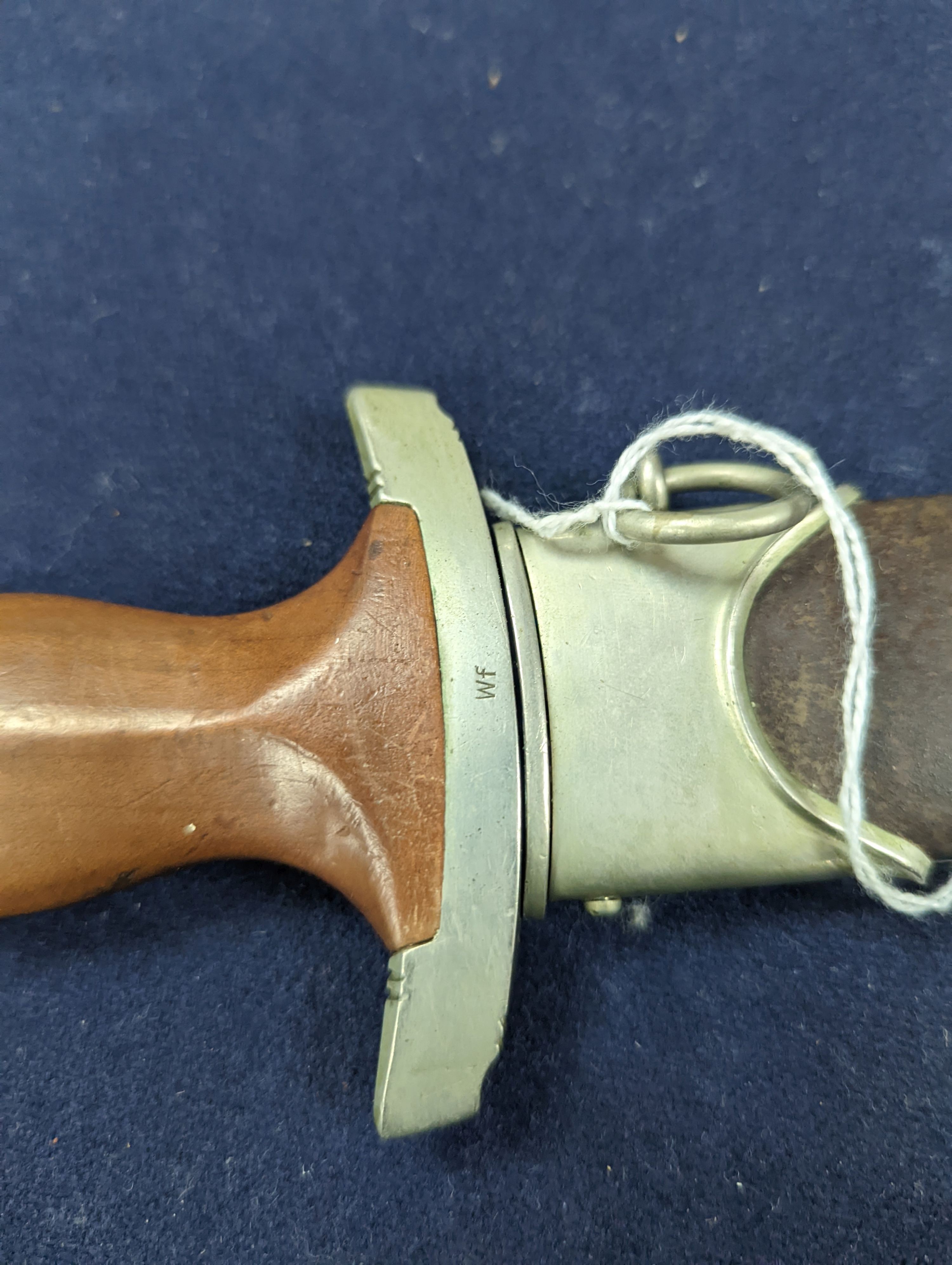 A Third Reich SA dagger within sheath, blade 22cm., and a bayonet within scabbard